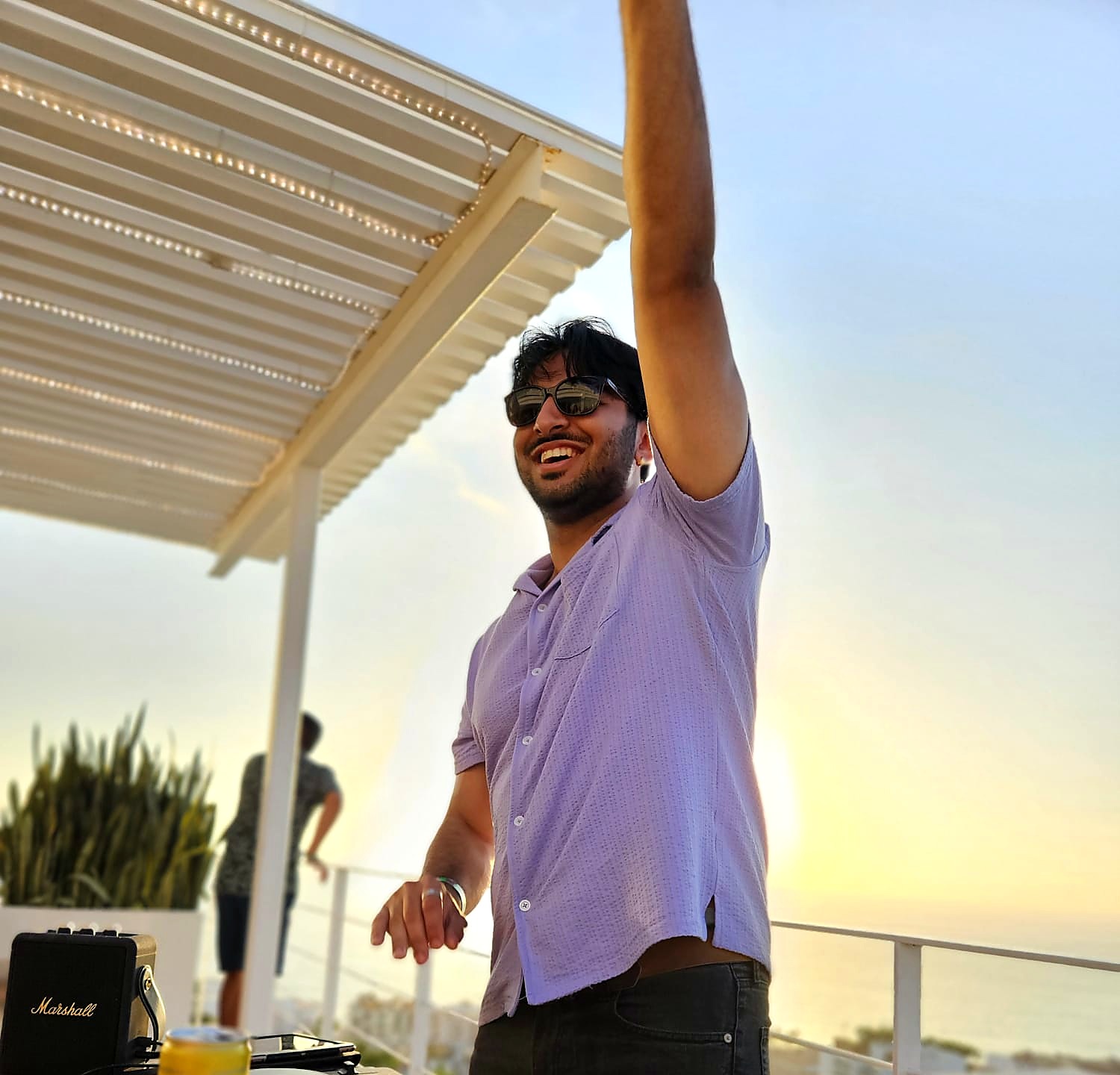 DJ DUA performing at a rooftop event in the Bay Area